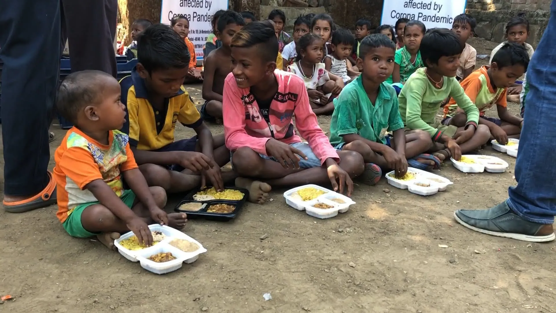 Children sitting and eating together